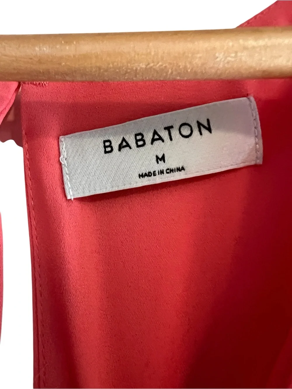 Babaton sleeveless Maddox blouse in
Coral with cut outs size M excellent conditi - Picture 11 of 12
